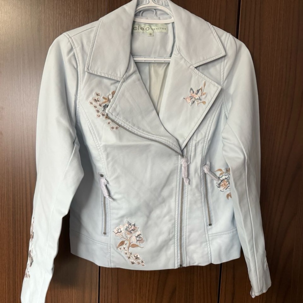 Light blue leather jacket with floral details